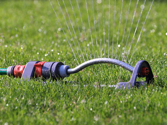 Kozy Lawn Care, Omaha Nebraska, taking care of your lawn, all you need to do is add the water. 